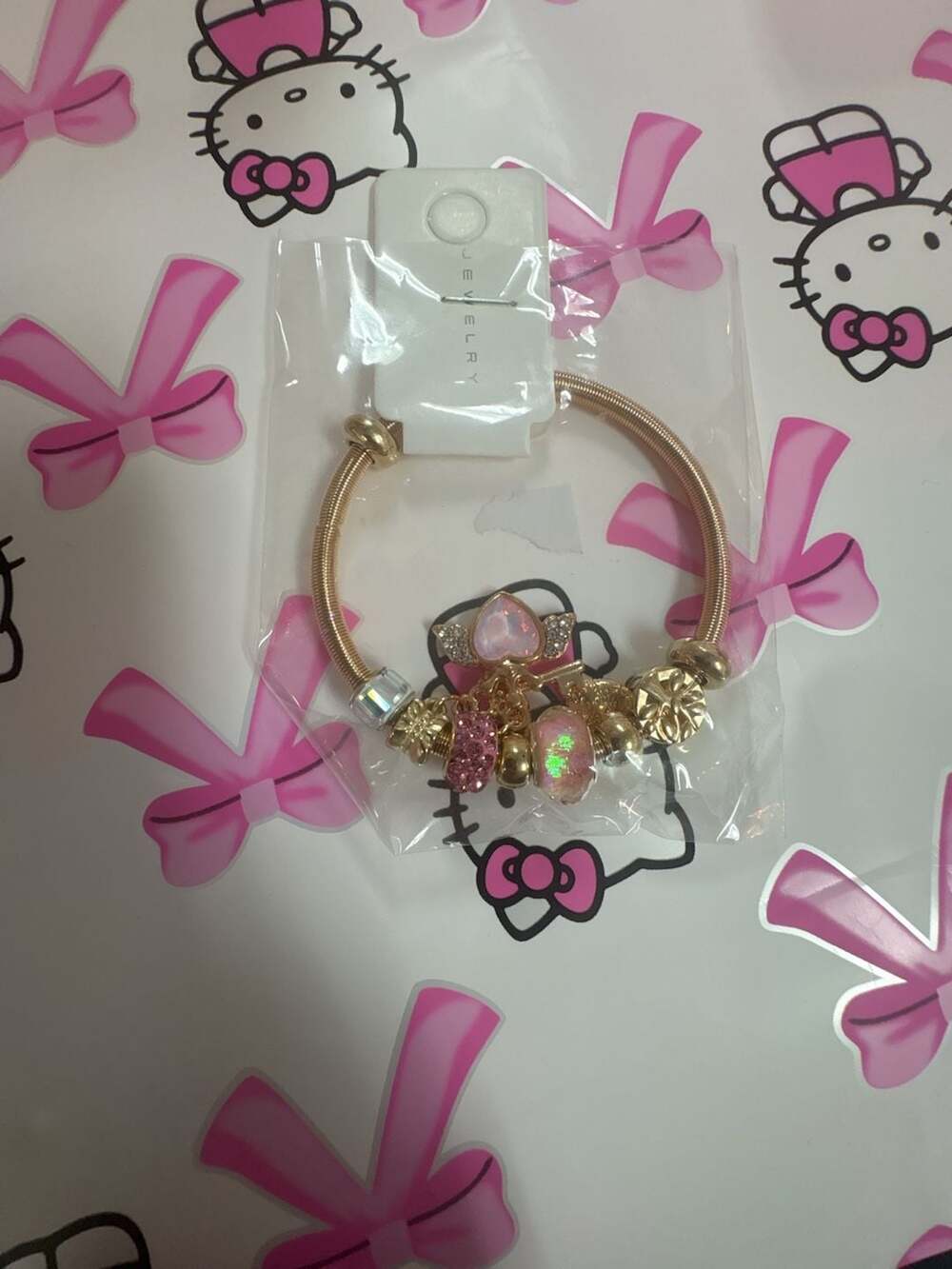 Hello Kitty Gold-Tone Charm Bracelet with Winged Heart and Beads